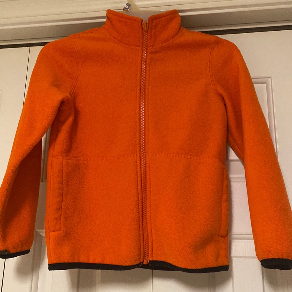 Place size S 5/6 child’s unisex orange jacket